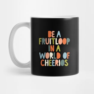 Be a Fruitloop in a World of Cheerios in black orange peach green and blue Mug